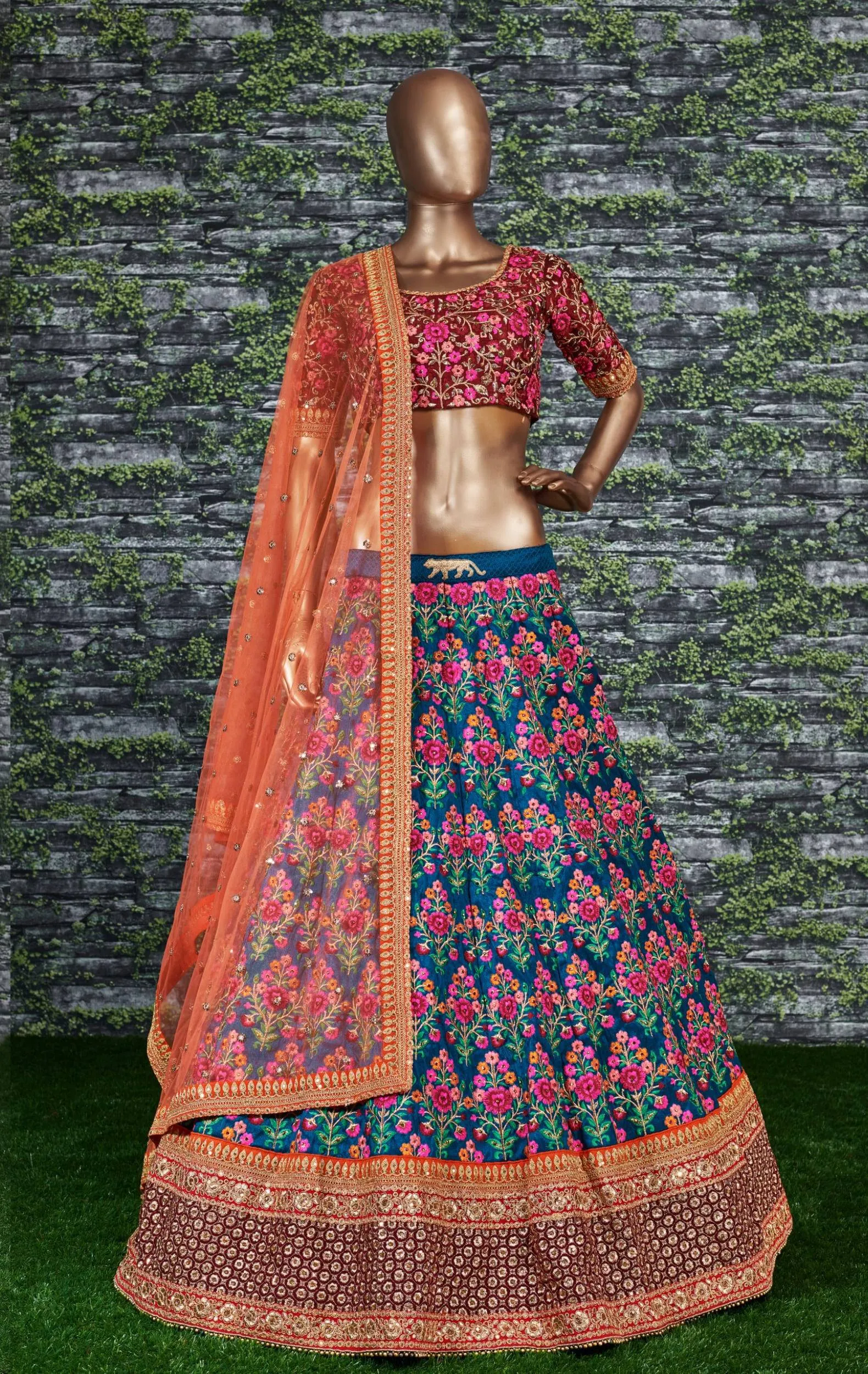 Flamboyant Blue-Red Colored Bridal wear Embroidered Lehenga Choli